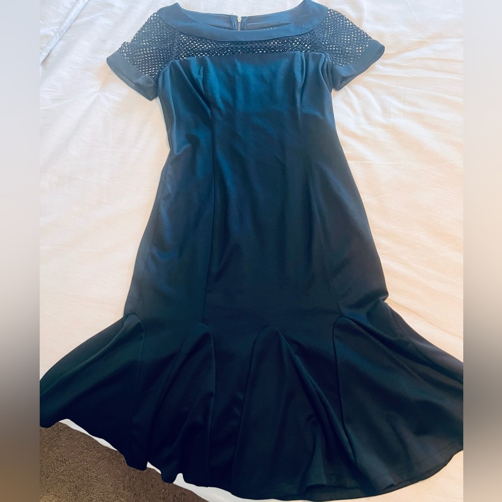 Black mermaid style black dress with mesh neckline. Size 7/8 - Medium.